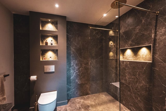 One of the properties five modern ensuite bathrooms with ambient lighting.