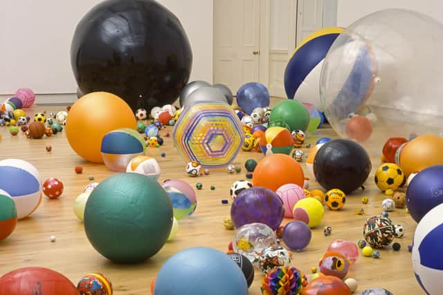 Martin Creed's Work No. 370 Balls (2004), a vast installation with 900 balls of different scale, weight and texture, in situ at Harrogate's Mercer Gallery.