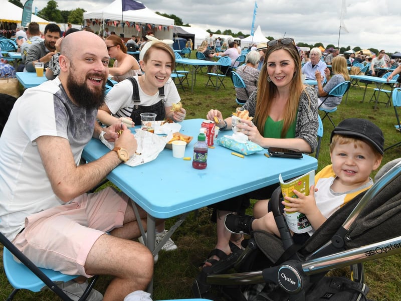 The Willis family enjoying the great food on offer at the festival in the sunshine
