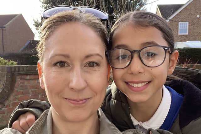 Charlotte Poran (left) will have to apply for a paid place on a bus at a cost of around £800 a year to take her daughter Anya (right) to Boroughbridge High School following North Yorkshire Council's change to its home-to-school transport policy