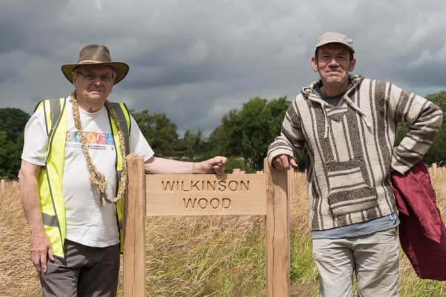 Celebrating the news of Wilkinson Wood - Bilton's Keith Wilkinson MBE and Chris Kitson of Long Lands Common in Harrogate.