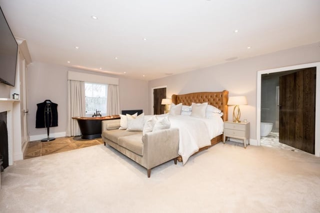 A super size bedroom with en suite shower room and the added feature of a free standing copper bath tub, with garden views.