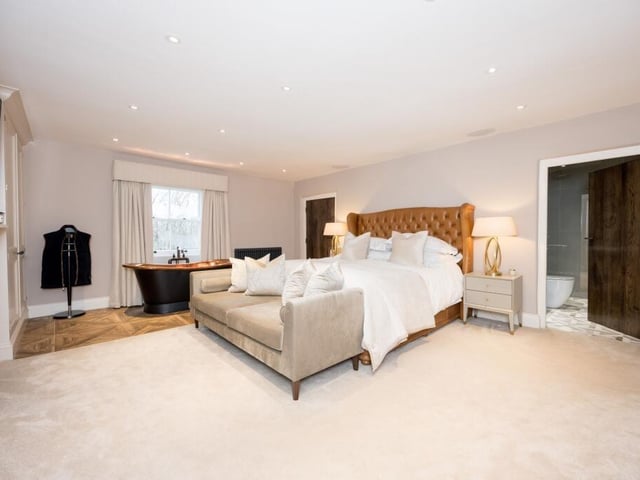 A super size bedroom with en suite shower room and the added feature of a free standing copper bath tub, with garden views.