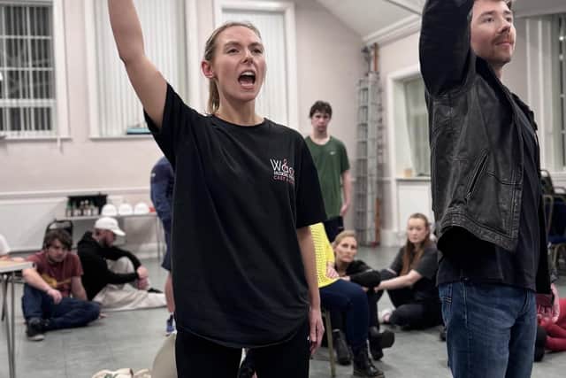 Ellie Morrow in rehearsals for We Will Rock You