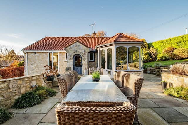 One level of the appealing property, with an outdoor garden terrace.