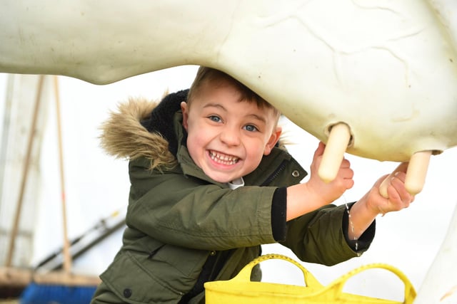 Robin Rice, aged four, from York, milking a replica cow