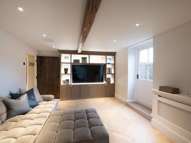A beamed snug or family room.