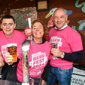 Part of the volunteer team manning a beer stand at this year's Henshaw Beer Fest at Henshaws Arts and Crafts centre in Knaresborough where more than 3,000 drinks were served. (Picture Mike Whorley)