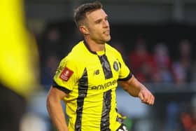 Jack Muldoon celebrates after scoring what proved to be the winning goal during Harrogate Town's FA Cup first-round clash with Wrexham. Pictures: Matt Kirkham