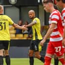 Cathal Heffernan congratulates Warren Burrell after he handed Harrogate Town the lead during Saturday's pre-season clash with Doncaster Rovers. Pictures: Matt Kirkham
