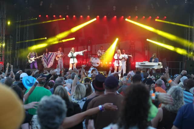 Abba Revival perform to teh crowd at Tribfest. Pic Dave Lofthouse