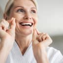 Research suggests that flossing your teeth at least once a week can markedly reduce the risk not only of having a stroke, but also reduce the risk of developing atrial fibrillation. Photo: StockAdobe
