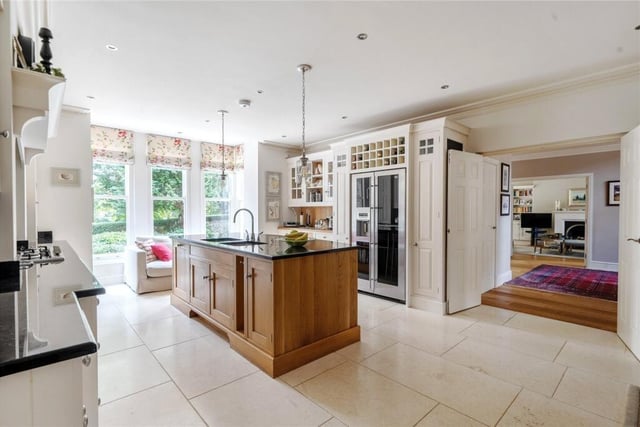 The high spec kitchen with central island.