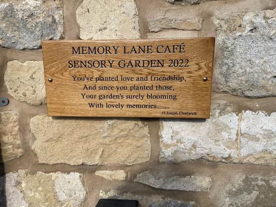 The official plaque for the new Sensory Garden in Knaresborough which has been created by Mathew Parker; known as Oak Bloke from York.