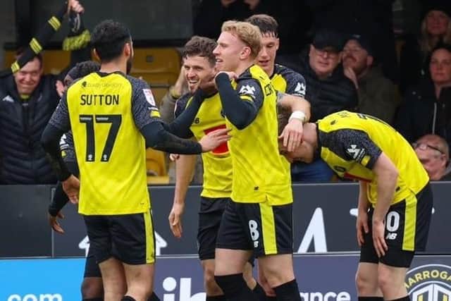 Harrogate Town players celebrate during Easter Monday's 5-1 home success over Gillingham. Pictures: Matt Kirkham