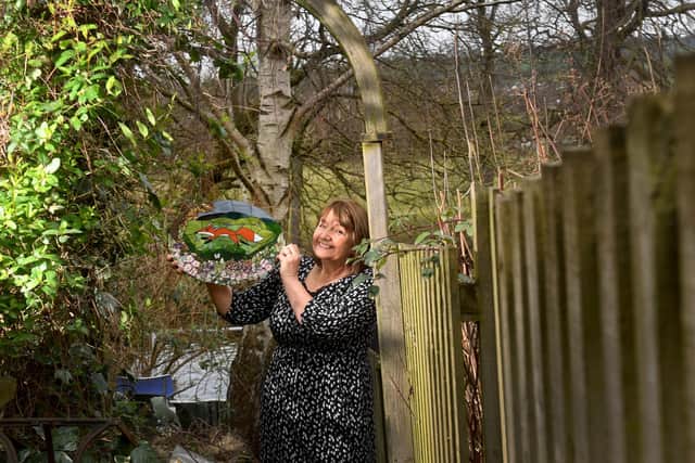 Mosaic artist Flick Gillett with her work, at Otley. Flick will be showing her work for homes and gardens at the BAMM North exhibition at RHS Harlow Carr until April 16, 2013. Picture taken by Yorkshire Post photographer Simon Hulme.