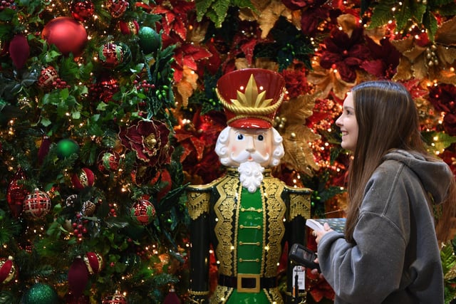 Visitors taking a look at one of the many beautiful Christmas displays on show at the fair