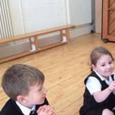 Youngsters at Harrogate's Ashville College enjoying a genuinely hands-on experience when Prickly Pigs brought along a two-year-old hedgehog called Rhubarb. (Picture contributed)