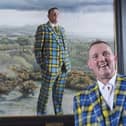 Doddie Weir with his painting in the Scottish National Portrait Gallery (SNPG)