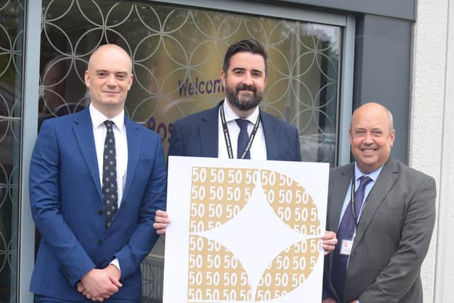 Pictured left to right with Rossett’ School's 50th anniversary logo are deputy headteacher Pete Saunders, headteacher Tim Milburn and deputy headteacher Dave Royles. (Picture contributed)