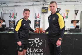 Harrogate Town players Josh Falkingham and Jack Muldoon launch the new The Black Sheep Baa…r at EnviroVent Stadium.