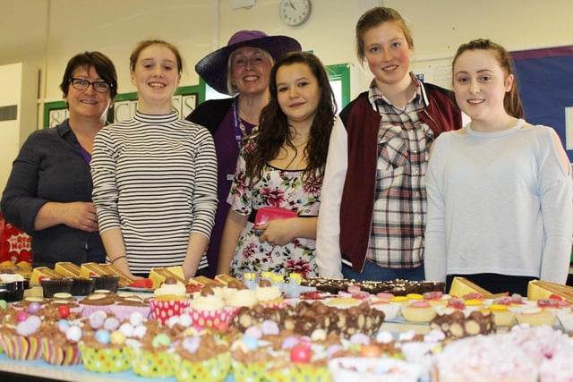 Selling cakes for Comic Relief at Amble in 2017.