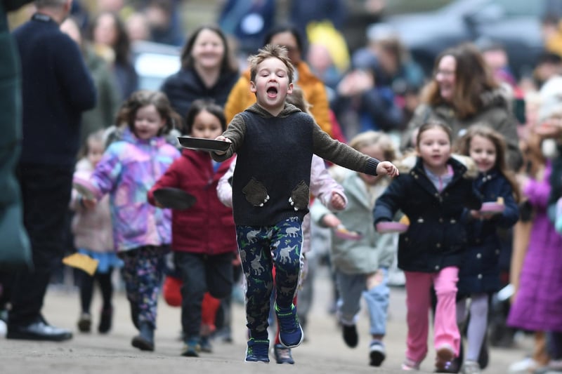 It was clear from all the faces that the pancake race is a wonderfully entertaining event.