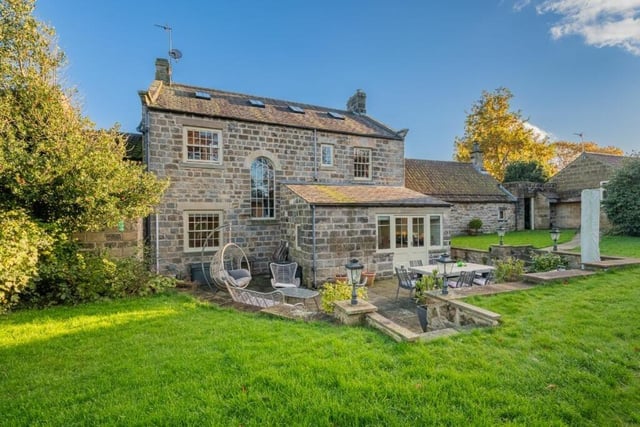 A stunning al fresco and entertaining terrace with views of the garden.