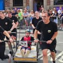 Harrogate and Knaresborough MP Tom Gordon, right,  and his parliamentary team taking part in this year’s Knaresborough Bed Race to raise funds for Knaresborough Town AFC. (Picture contributed)