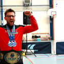 Roar of victory - Harrogate's Jonathan Skinner is now officially a five-times world champion in the kettlebell.