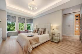 This bedroom has a feature copper bath.