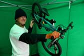 Steve Shearsby of Resurrection Bikes fixing a donated bike