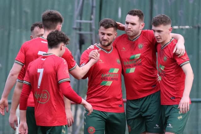 Albert Ibrahimi, centre, is congratulated after opening the scoring during Harrogate Railway's home win over Worsbrough Bridge Athletic. Pictures: Craig Dinsdale