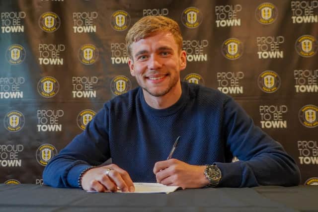 Jack Evans will wear the number four shirt at Harrogate Town.