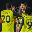 Anthony O'Connor, centre, is congratulated by Kayne Ramsay and Abraham Odoh after firing Harrogate Town into a two-goal lead against Nottingham Forest Under-21s. Pictures: Matt Kirkham