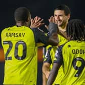 Anthony O'Connor, centre, is congratulated by Kayne Ramsay and Abraham Odoh after firing Harrogate Town into a two-goal lead against Nottingham Forest Under-21s. Pictures: Matt Kirkham