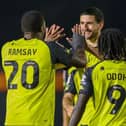 Anthony O'Connor, centre, is congratulated by Kayne Ramsay and Abraham Odoh after firing Harrogate Town into a two-goal lead against Nottingham Forest Under-21s. Pictures: Matt Kirkham