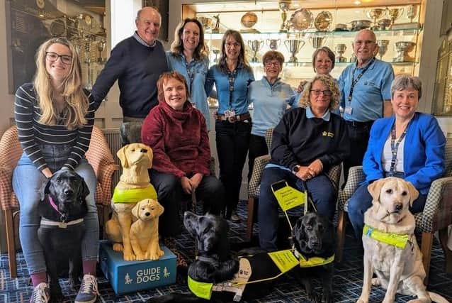 Some of the volunteers from the Harrogate District and Wetherby fundraising branch of Guide Dogs and the two club captains, Margaret Liddle and Paul Dutton (without lanyards on the back row)
