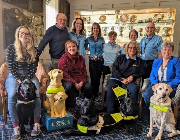 Some of the volunteers from the Harrogate District and Wetherby fundraising branch of Guide Dogs and the two club captains, Margaret Liddle and Paul Dutton (without lanyards on the back row)