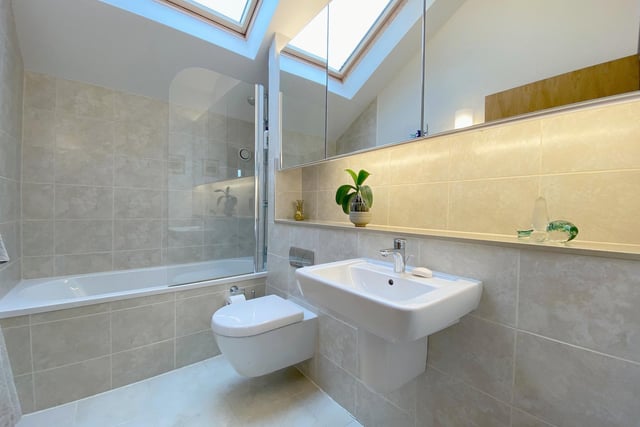 One of three stylish bath and shower rooms within the property.