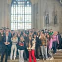 Sir Julian Smith, MP for Skipton and Ripon, with visiting youngsters inside Parliament. (Picture contributed)