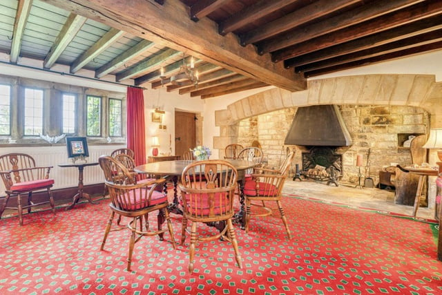 The property has two impressive reception rooms with inglenook fireplaces, including a separate sitting room for guests.