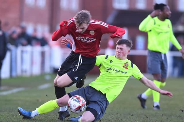 Boro's Joe Navier hurdles the challenge of a visiting defender.