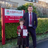 Talented eight-year-old Ashville Prep School pupil Jessica Essen with Ashville Prep School Head Asa Firth.