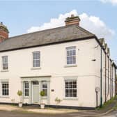 The appealing front view of the property, in the village of Wath
