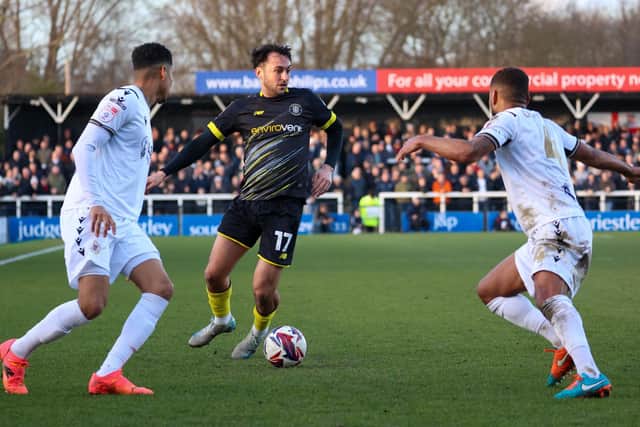 Levi Sutton looks for a way through the Bromley defence during Saturday's League Two clash.