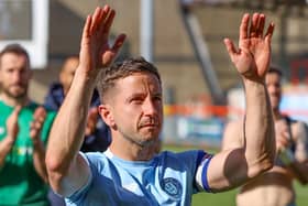 Josh Falkingham takes the applause of Harrogate Town's travelling fans following Saturday's 2-1 win at Morecambe. Pictures: Matt Kirkham