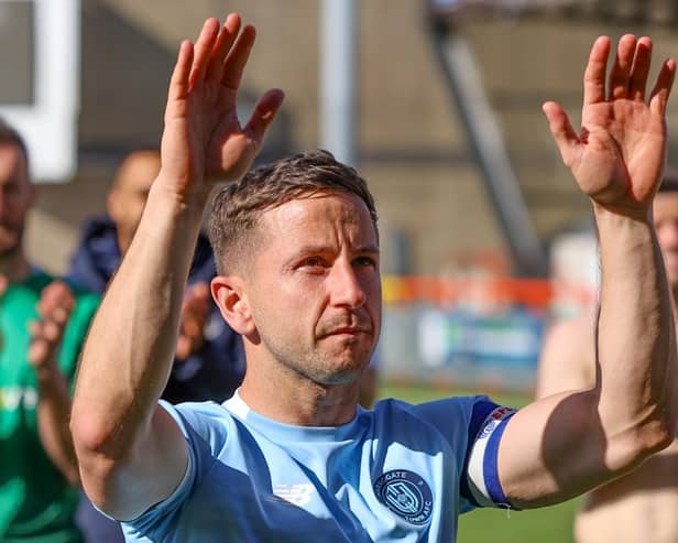 Josh Falkingham takes the applause of Harrogate Town's travelling fans following Saturday's 2-1 win at Morecambe. Pictures: Matt Kirkham
