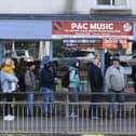 People waiting on the pavement outside P&C Music shop in Harrogate on Saturday before doors opened at 8am for Record Store Day 2024. (Picture Gerard Binks)