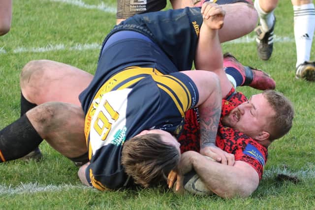 Harry Butler crashes over the Bridlington try-line.
